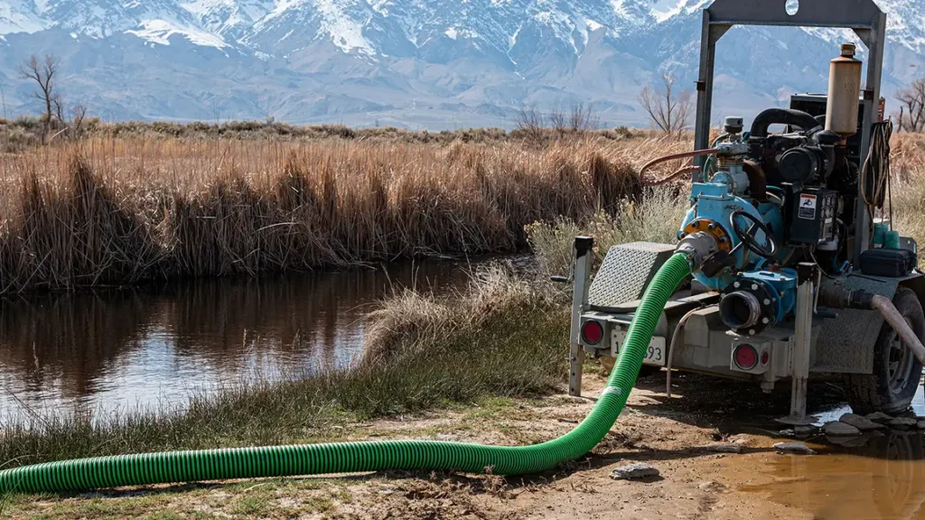 A stock image illustrating pumping water from a lake for irrigation concepts